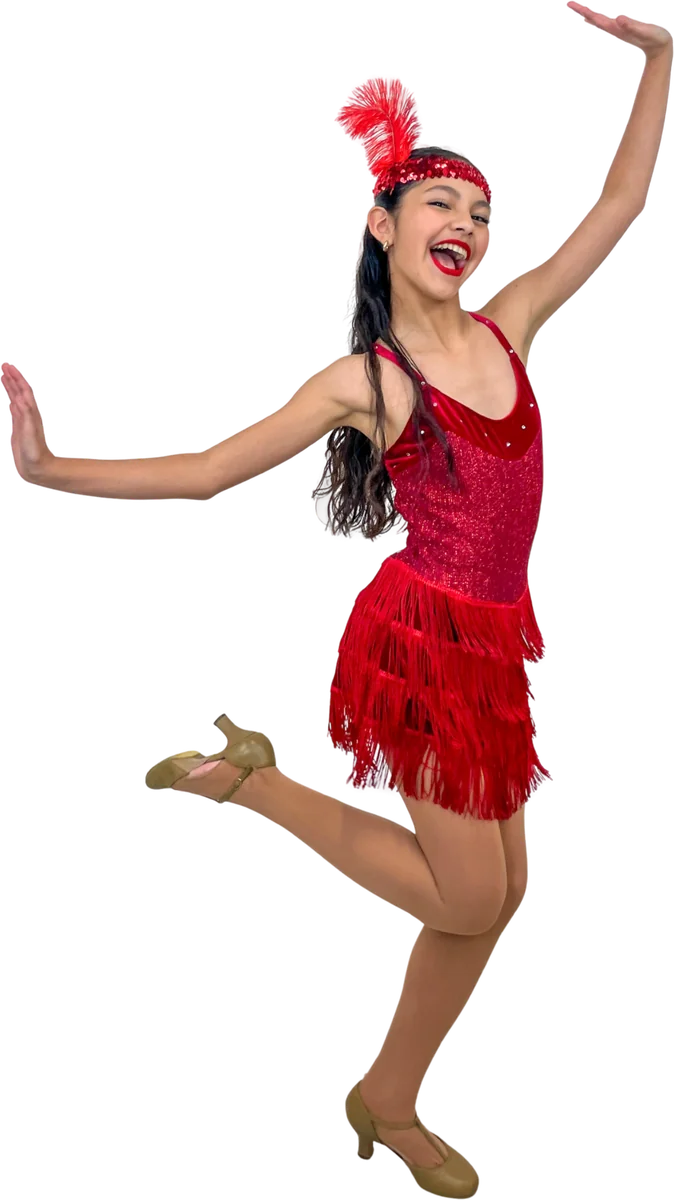 Dancer in a red fringed flapper dress and feather headband, knee lifted and arms raised